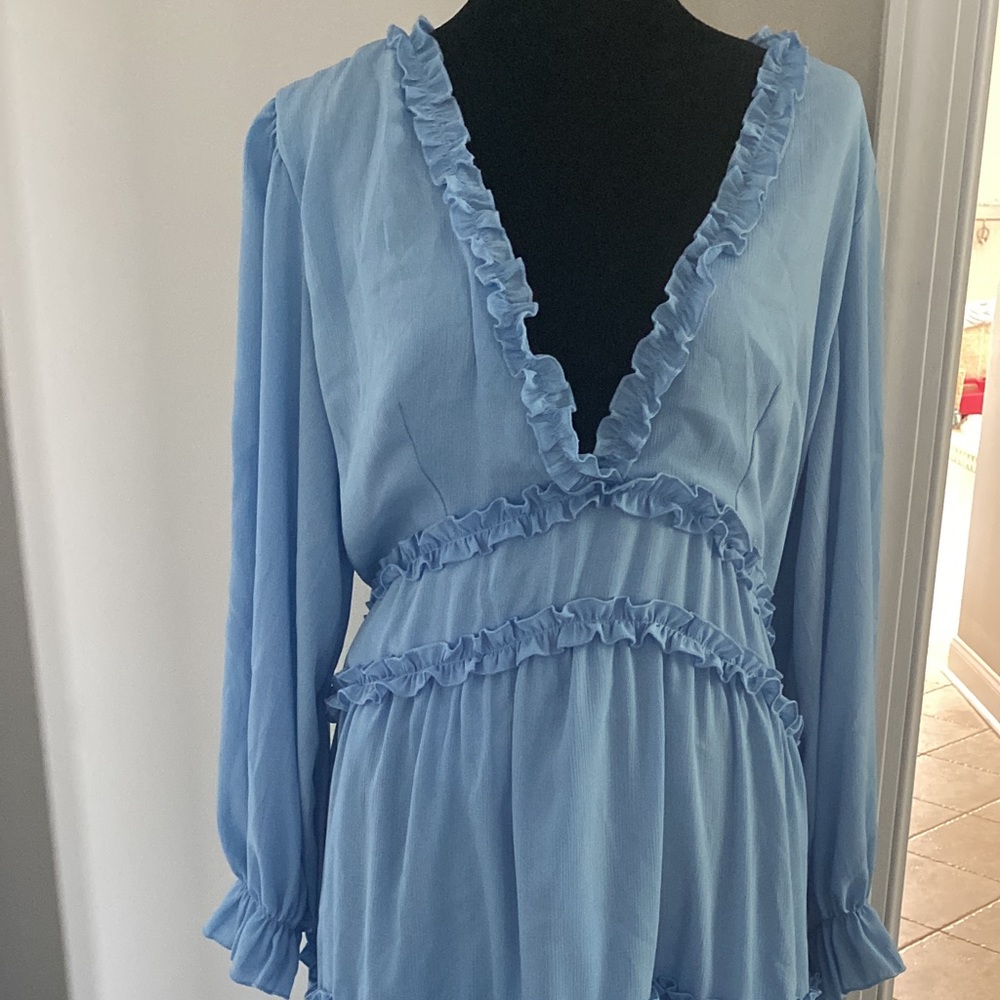 Frilly blue deep plunge open back dress